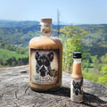 Waldsau Haselnuss-Sahnelikör in Flasche mit Etikett und Korkverschluss